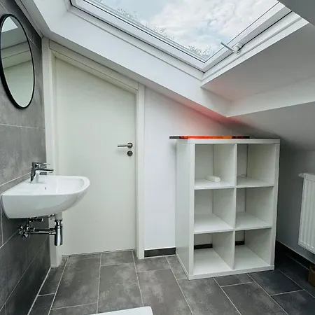 Charming Attic Retreat With Sloped Roof Apartment